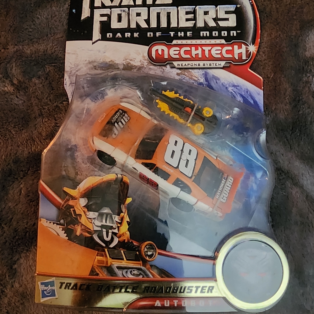 New in Box Transformers Dark of The Moon, Mechtech Track Battle Roadbuster